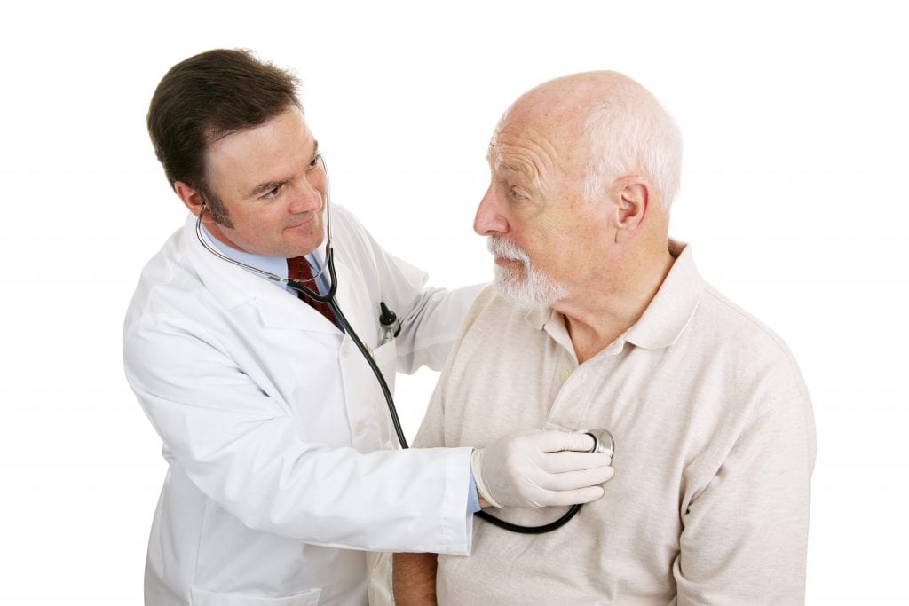 Senior Man Being Examined By A Doctor First Physicians